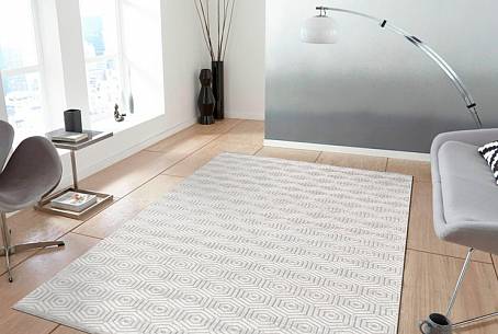 Серые ковры в интерьере: практичная покупка в дом